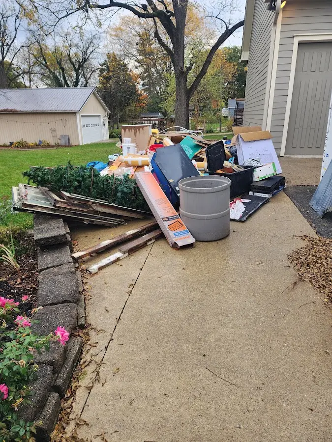 Dumpster being loaded with debris for 3 Yard Dumpster Rental in Salt Lake City